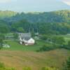 This shot is looking down from a road higher up in the subdivision.  The house is not yet built.  It will sit in to the right of the house pictured.