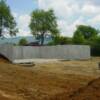 We use poured concrete for our foundation walls never cinder block.