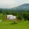 This house sits next to the front gate of the Castle Rock Golf Course and overlooks the 15th green.